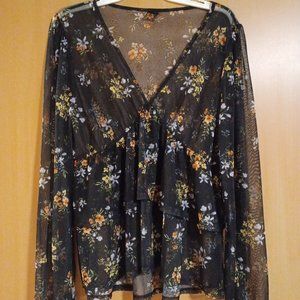 Flower long sleeved dressy top.